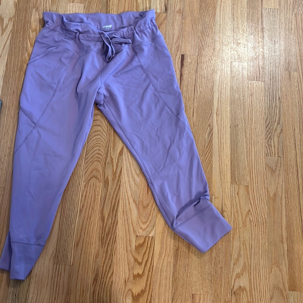 Gorgeous color purple workout leggings with tie waist new never worn